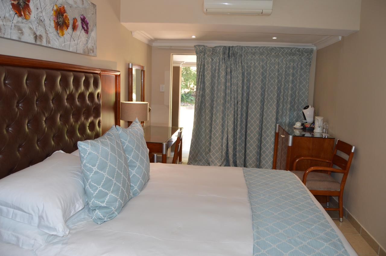 Airport Gardens Boutique Hotel บ็อคสเบิร์ก ภายนอก รูปภาพ